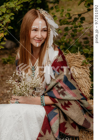 Beautiful young bride in a boho dress. 97201092
