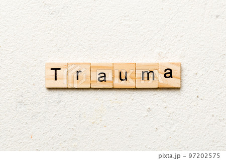 trauma word written on wood block. trauma text on table, concept 97202575