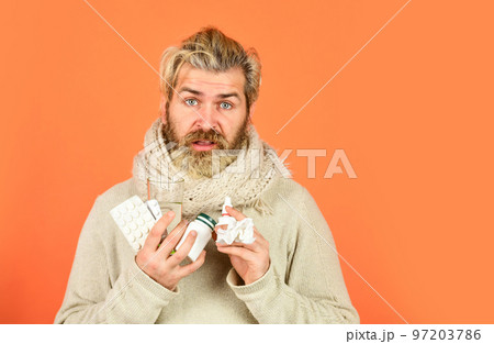 Bottle blister plastic container. Apothecary concept. Lot of medicines. Man sick leave at home. Medicines effective treatment. Bearded guy messy hair hold pills tablets vitamins medicines in hands Bottle blister plastic container. Apothecary concept. Lot of medicines. Man sick leave at home. Medicines effective treatment. Bearded guy messy hair hold pills tablets vitamins medicines in hands 97203786