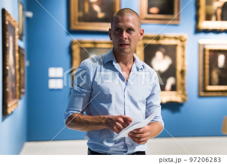Portrait of man in gallery Portrait of man in gallery 97206283