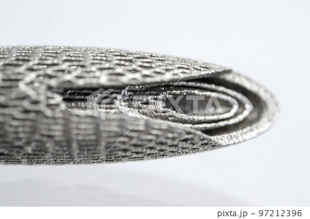 Models printed on 3D printer for metal macro. Object surface close-up. Layout created on metal 3D printer. New modern progressive additive 3D printing technology. Prototyping, Industrial production Models printed on 3D printer for metal macro. Object surface close-up. Layout created on metal 3D printer. New modern progressive additive 3D printing technology. Prototyping, Industrial production 97212396
