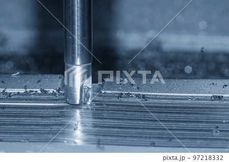 Close up scene the CNC milling machine rough cutting the injection mold parts by indexable tools. Close up scene the CNC milling machine rough cutting the injection mold parts by indexable tools. 97218332