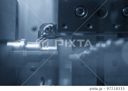 The hi-technology metal working processing by CNC turning machine . The hi-technology metal working processing by CNC turning machine . 97218333