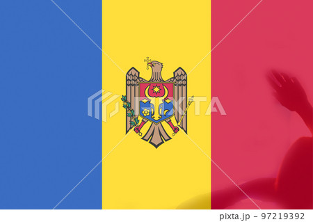 Defocus protest in Moldova. Moldova flag painted on many people hands background. Strength, Power, Protest concept. Russia war. Out of focus 97219392