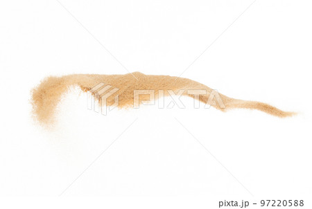 Small size fine Sand flying explosion, Golden grain wave explode. Abstract cloud fly. Yellow colored sand splash silica in Air. White background Isolated high speed shutter, throwing freeze shot Small size fine Sand flying explosion, Golden grain wave explode. Abstract cloud fly. Yellow colored sand splash silica in Air. White background Isolated high speed shutter, throwing freeze shot 97220588