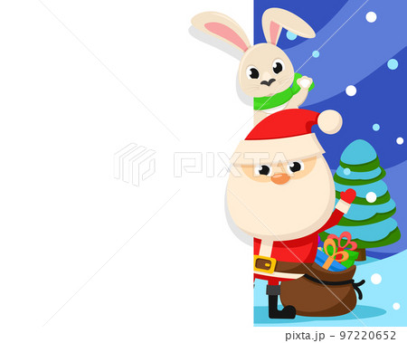 Santa Claus and a hare look from behind a white background. Place for text, Christmas. 97220652