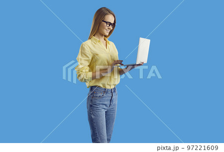 Young woman use computer working online Young woman use computer working online 97221609