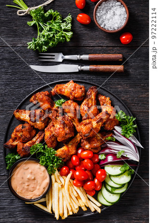 roast chicken wings with french fries and veggies roast chicken wings with french fries and veggies 97222114
