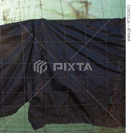 Metal wire fence and synthetic fabric. Metal wire fence and synthetic fabric. 97222621
