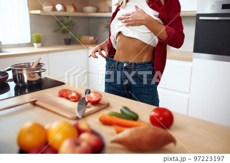 Diet Woman Showing How Much Weight She Lost. Cropped View Of Diet Lady 97223197