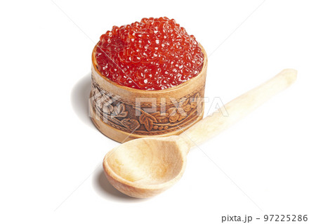 delicious red caviar in wooden bowl isolated on white background. delicious red caviar in wooden bowl isolated on white background. 97225286