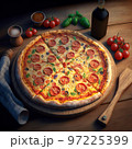 pepperoni pizza on a wooden board with ingredients - tomatoes, oregano 97225399