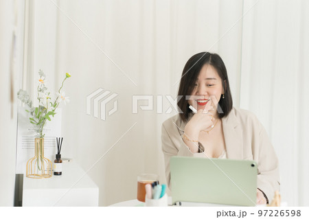 asian business and writer woman smile and happy during think new idea and meeting online asian business and writer woman smile and happy during think new idea and meeting online 97226598