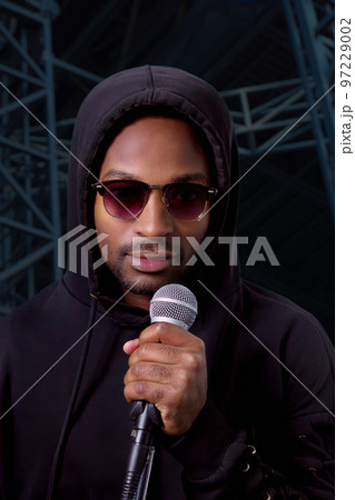 artist on stage live performance singer microphone vocalist musician karaoke 97229002