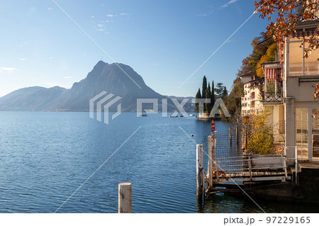 Bank of lake Lugano and mountain next to town Lugano - photo from so-named olive trail Bank of lake Lugano and mountain next to town Lugano - photo from so-named olive trail 97229165