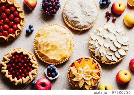 Delicious freshly baked cherry pie decorated with fresh berries 97230250