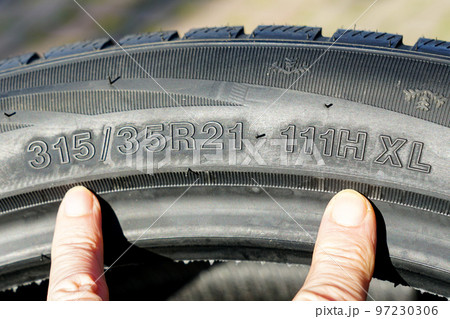 Side view of tire with tire width, height and wheel diameter designations, speed and load indices Side view of tire with tire width, height and wheel diameter designations, speed and load indices 97230306