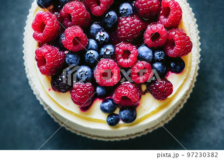 Delicious homemade cheesecake with thick coating of fresh fragrant berries Delicious homemade cheesecake with thick coating of fresh fragrant berries 97230382