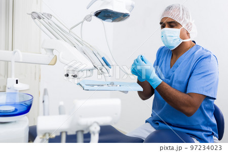 Male dentist is ready to accept client 97234023