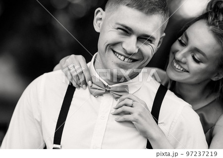 Close-up portrait of a young couple.  97237219