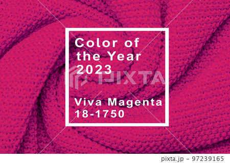 The texture of warm knitted sweater. Beautiful handmade knitted repeating pattern. Demonstrating Pantone color of the year 2023 viva magenta. The texture of warm knitted sweater. Beautiful handmade knitted repeating pattern. Demonstrating Pantone color of the year 2023 viva magenta. 97239165