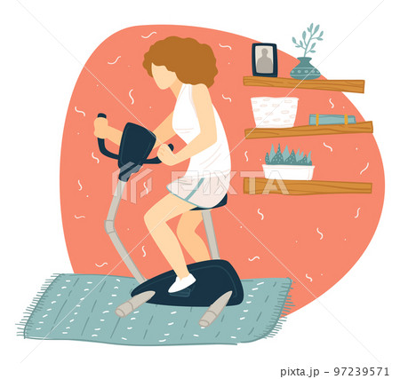 Woman using bike at home to keep fit Woman using bike at home to keep fit 97239571