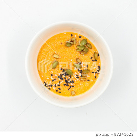 Hummus with seeds in a bowl on a white background. Top view, isolate Hummus with seeds in a bowl on a white background. Top view, isolate 97241625