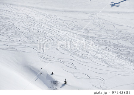 Ski tracks in powder snow Ski tracks in powder snow 97242382