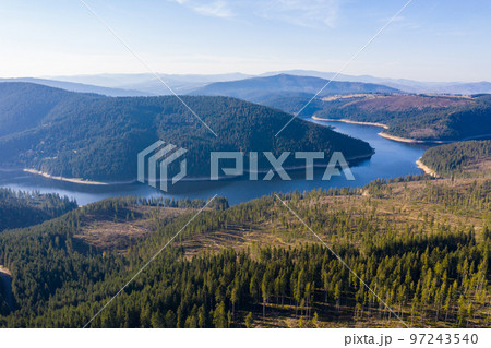 Aerial shot of a lake and forest 97243540