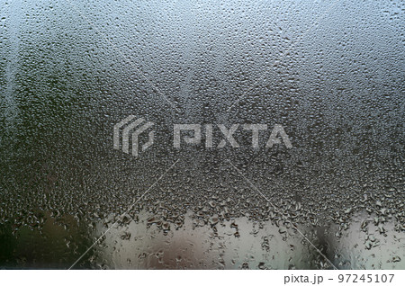 Morning condensation on the windows during the cooling period outside. Morning condensation on the windows during the cooling period outside. 97245107