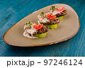 veal on zucchini with mushroom sauce 97246124