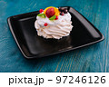 Anna Pavlova cake with cream and fresh berries 97246126