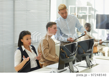 Diverse group people working in call center Diverse group people working in call center 97248540