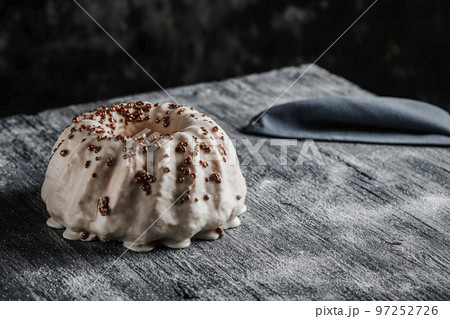 gugelhupf cake covered with a vanilla frosting gugelhupf cake covered with a vanilla frosting 97252726