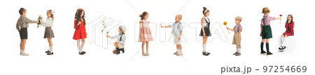 Collage. Portraits of little boys and girls, charming kids in retro style outfit, isolated on white background. Presenting flowers. Art, childhood, care 97254669