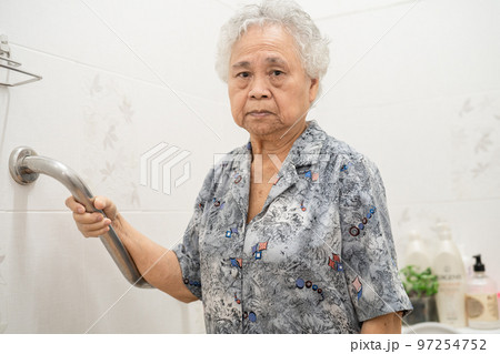 Asian senior or elderly old lady woman patient use toilet bathroom handle security in nursing hospital ward, healthy strong medical concept. Asian senior or elderly old lady woman patient use toilet bathroom handle security in nursing hospital ward, healthy strong medical concept. 97254752