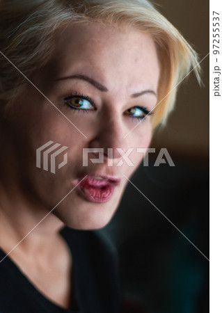 Close up portrait of an attractive blonde woman. 97255537