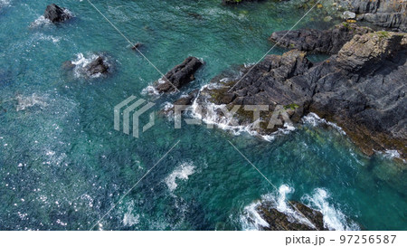 Beautiful sea rocks and turquoise water. Seascape top view. Beautiful places of Ireland. A natural attraction. Beautiful sea rocks and turquoise water. Seascape top view. Beautiful places of Ireland. A natural attraction. 97256587