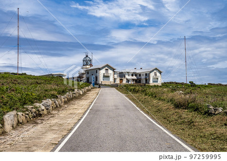 Lighthouse at Estaca de Bares peninsula coast. Province of A Coruna, Galicia, Spain. 97259995