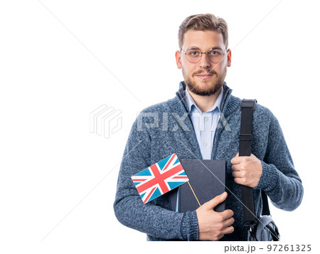Man holding books and flag 97261325
