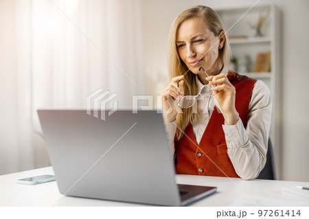 Attractive lady freelancer at home 97261414