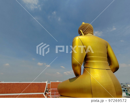 Back view Golden big Buddha statue(Phra Buddha Dhammakaya Thep Mongkol) in Wat Pak Nam Phasi Charoen 97269572