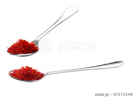 metal spoon with dried saffron spice isolated on white background. metal spoon with dried saffron spice isolated on white background. 97271549
