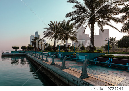 Abu Dhabi Skyline from Corniche. Abu Dhabi, Modern Skyscrapers and Landmark. Promenade in Abu Dhabi. United Arab Emirates, Middle East.  97272444