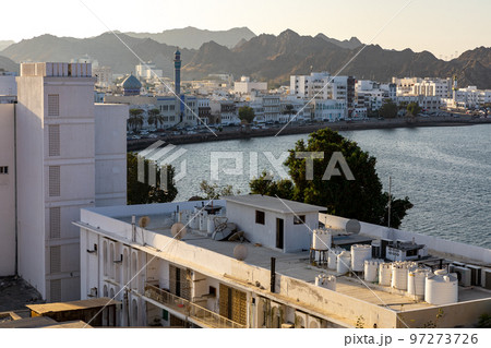 Mutrah Sunset. Cityscape View of Muscat at Beautiful Sunset. The Capital of Oman. Arabian Peninsula. Mutrah Sunset. Cityscape View of Muscat at Beautiful Sunset. The Capital of Oman. Arabian Peninsula. 97273726