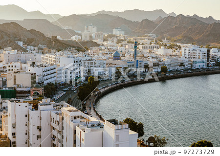 Mutrah Sunset. Cityscape View of Muscat at Beautiful Sunset. The Capital of Oman. Arabian Peninsula. Mutrah Sunset. Cityscape View of Muscat at Beautiful Sunset. The Capital of Oman. Arabian Peninsula. 97273729