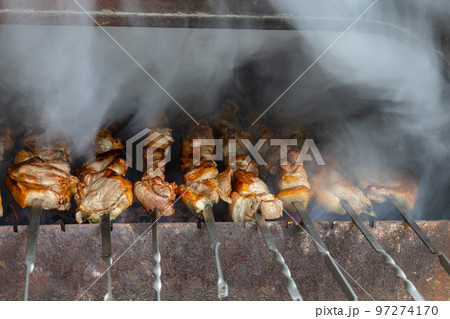 Cooking tasty barbecue in a brazier 97274170