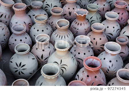 Hand Made Pottery in Nizwa Market. Clay Jars at the Rural Traditional Arabic Bazaar, Oman.  97274345