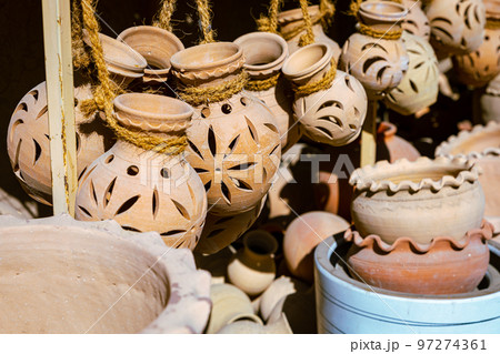Hand Made Pottery in Nizwa Market. Clay Jars at the Rural Traditional Arabic Bazaar, Oman.  97274361