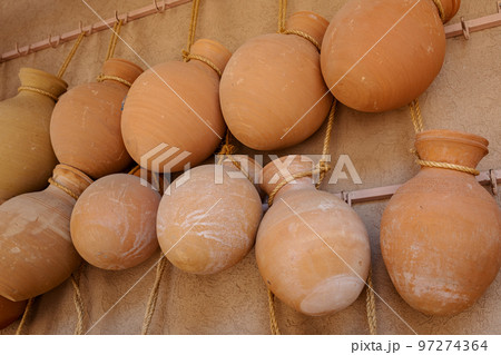 Hand Made Pottery in Nizwa Market. Clay Jars at the Rural Traditional Arabic Bazaar, Oman.  97274364